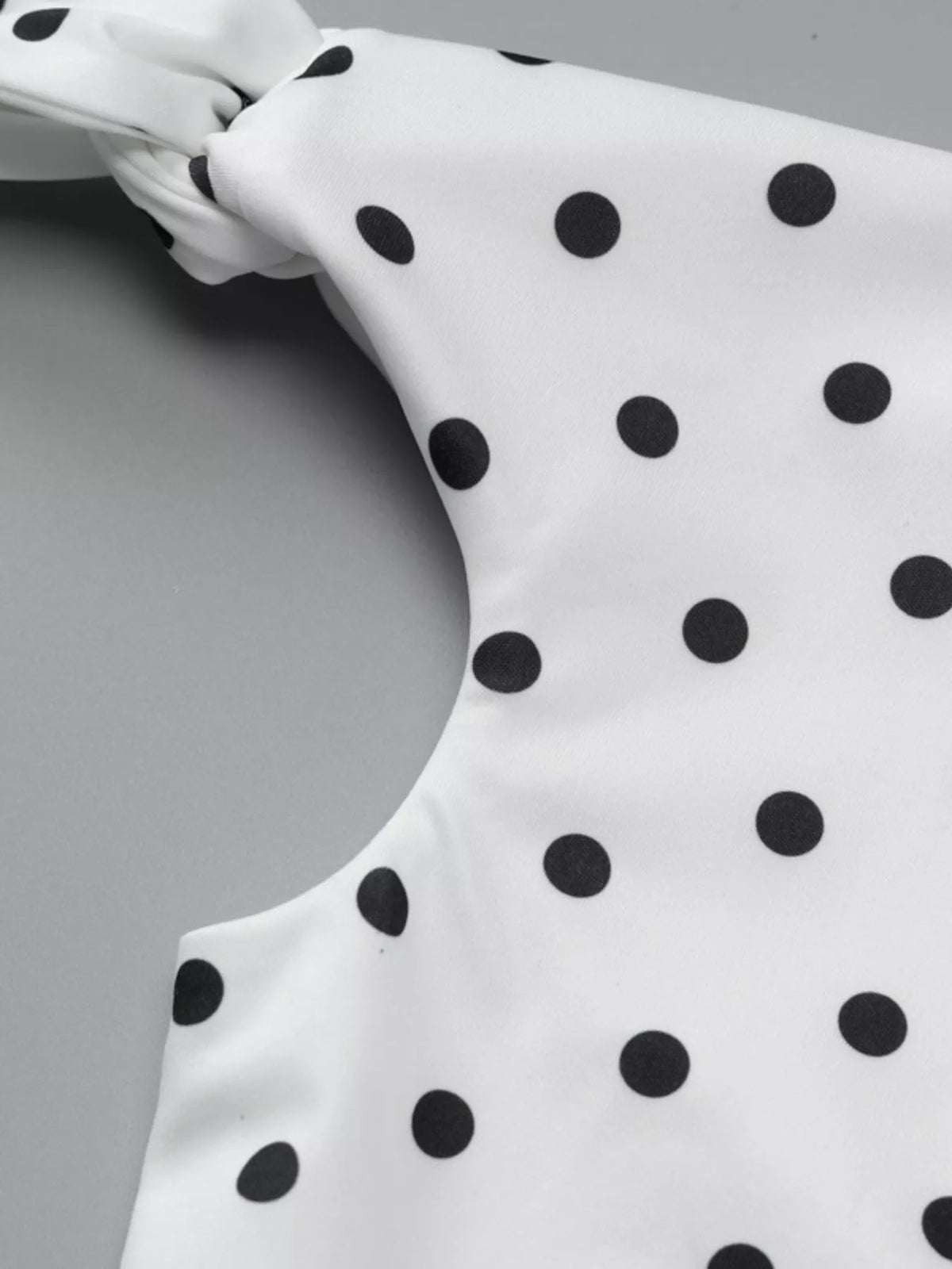 Polka Dot Sleeveless Mini Dress with Bow Accents - alternate view 5